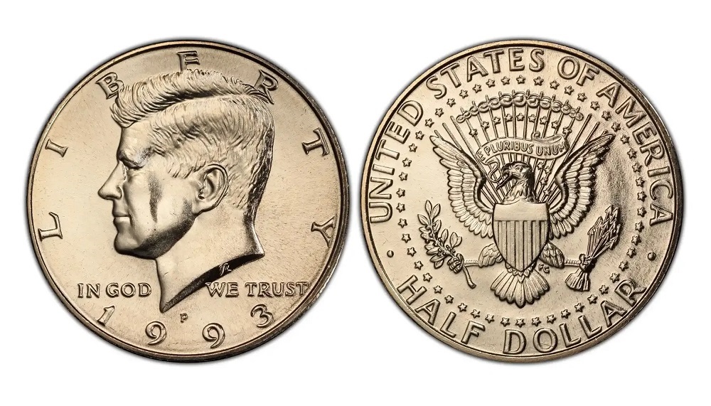 Close-up of 1993-P Kennedy half dollar showing die clash marks with ghost image from the reverse die visible in the obverse field