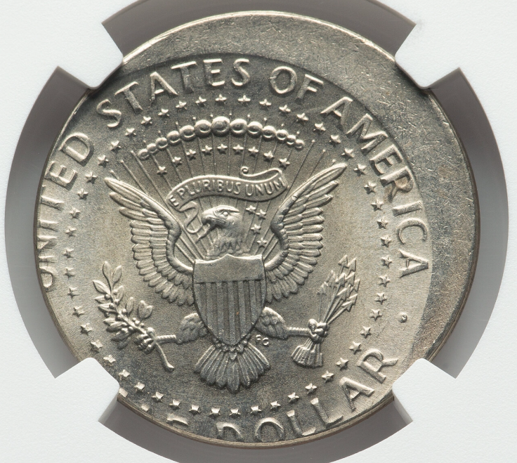 1993-D Kennedy half dollar off-center strike showing shifted design with blank crescent of unstruck planchet